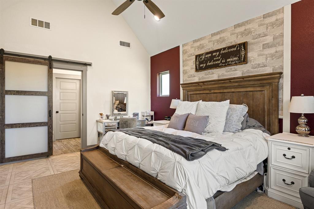 2000 Rattler Way Tolar, TX 76476 - Photo 11 of 33 a bedroom with bed and a window