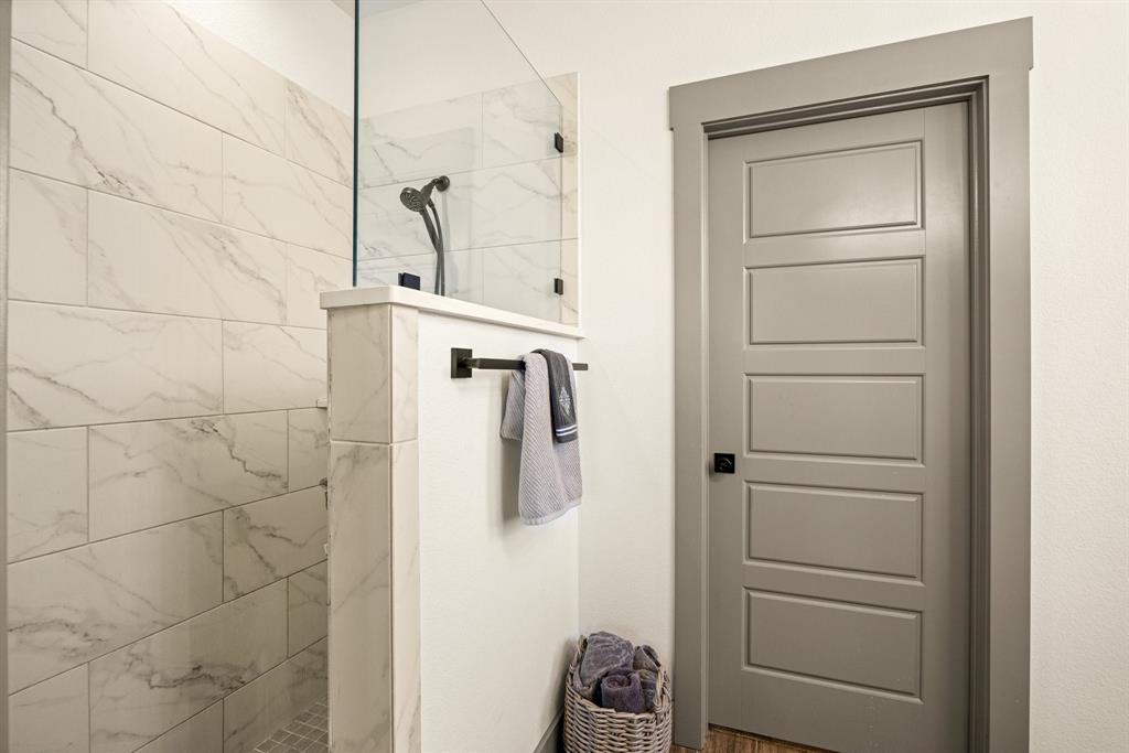 2000 Rattler Way Tolar, TX 76476 - Photo 13 of 33 a bathroom with a shower