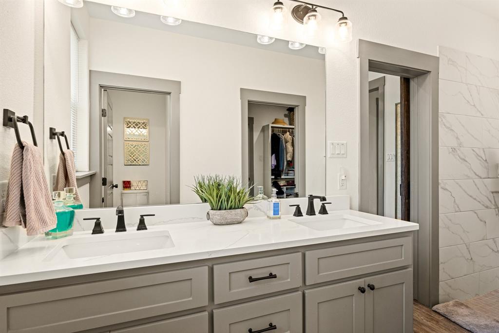 2000 Rattler Way Tolar, TX 76476 - Photo 14 of 33 a bathroom with a sink and a mirror