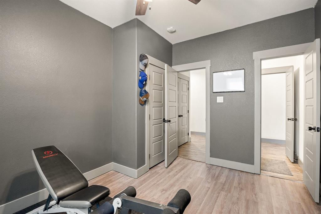 2000 Rattler Way Tolar, TX 76476 - Photo 18 of 33 a workspace with furniture and wooden floor