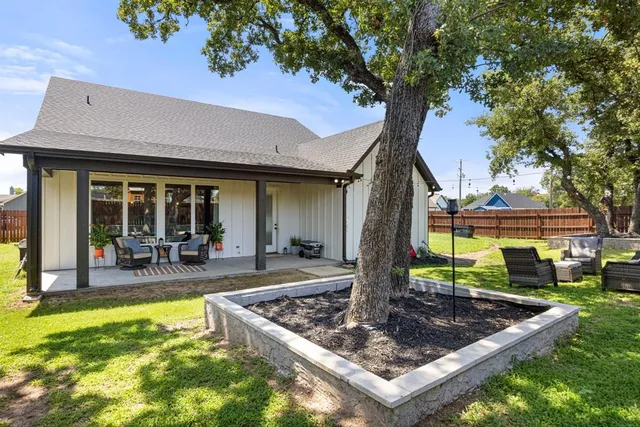 a bedroom with bed and a window