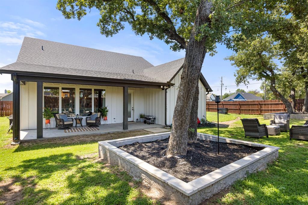 2000 Rattler Way Tolar, TX 76476 - Photo 22 of 33 a front view of a house with swimming pool and porch