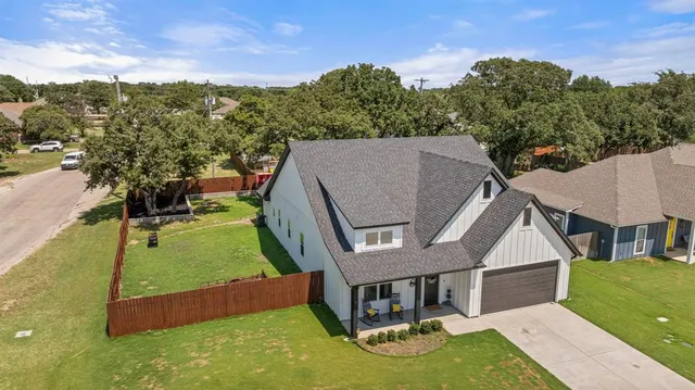 a view of a house with a swimming pool