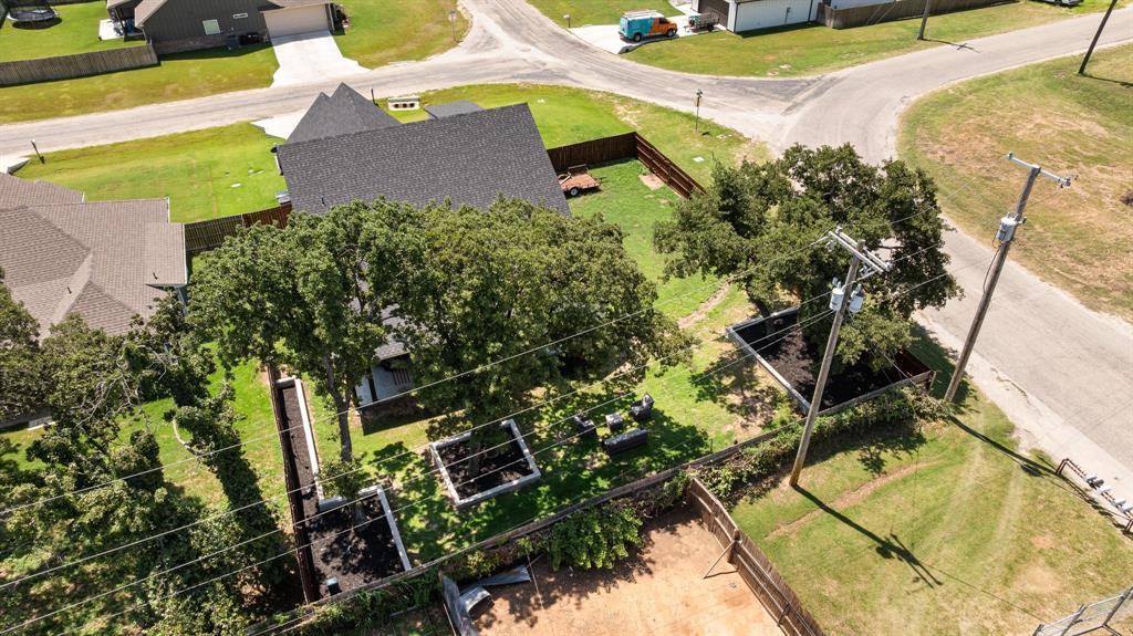 2000 Rattler Way Tolar, TX 76476 - Photo 31 of 33 a view of a yard with plants