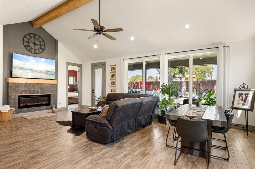 2000 Rattler Way Tolar, TX 76476 - Photo 7 of 33 a living room with furniture and a fireplace
