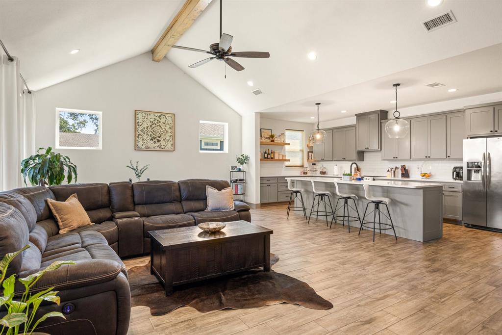 2000 Rattler Way Tolar, TX 76476 - Photo 9 of 33 a living room with furniture kitchen and a table
