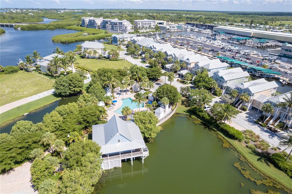 13230 Anglers Way Placida, FL 33946 - Photo 17 of 23 an aerial view of residential houses with outdoor space and lake view