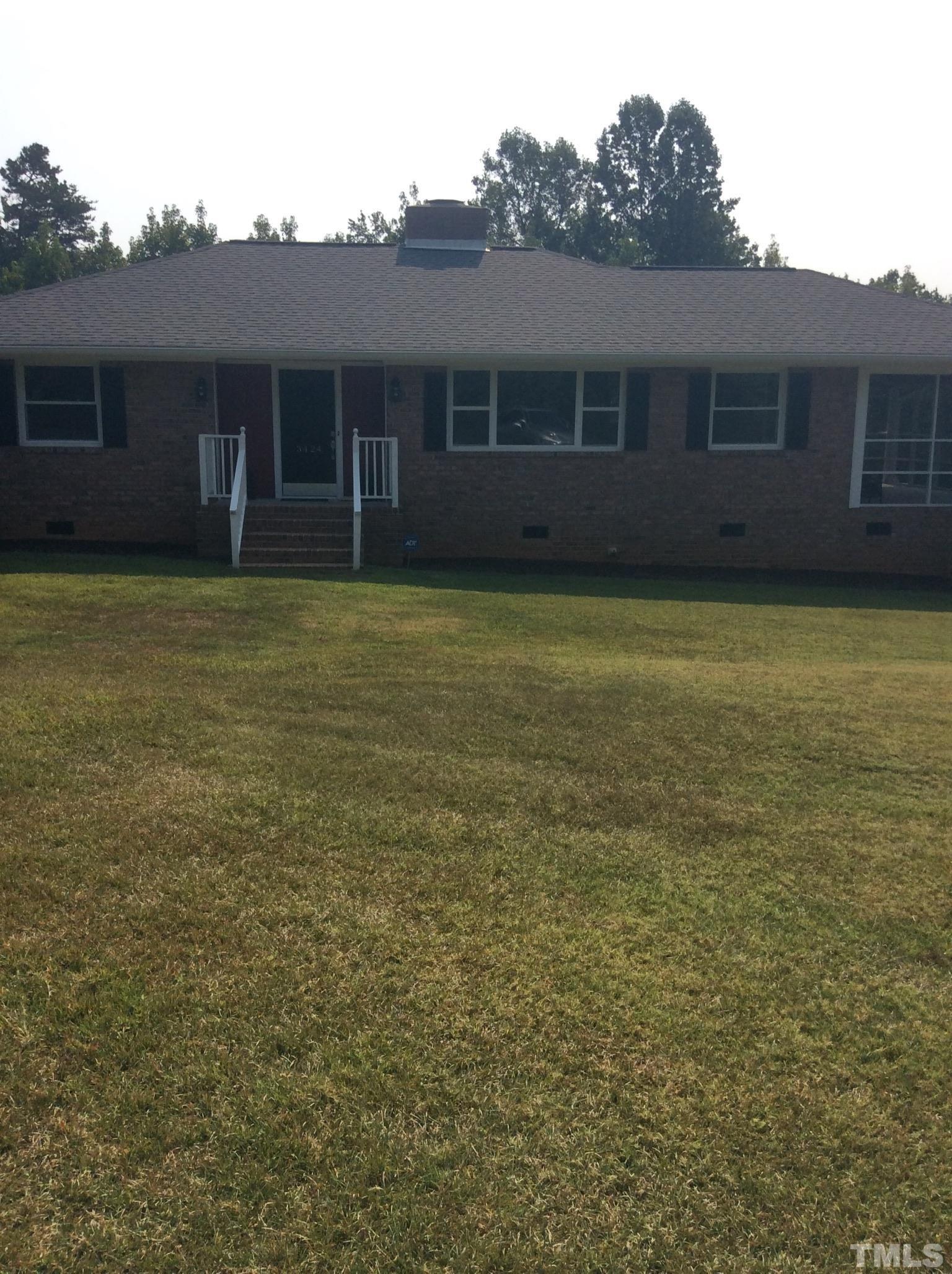 3424 Moriah Road Rougemont, NC 27572 - Photo 2 of 20 front view of a house with a yard