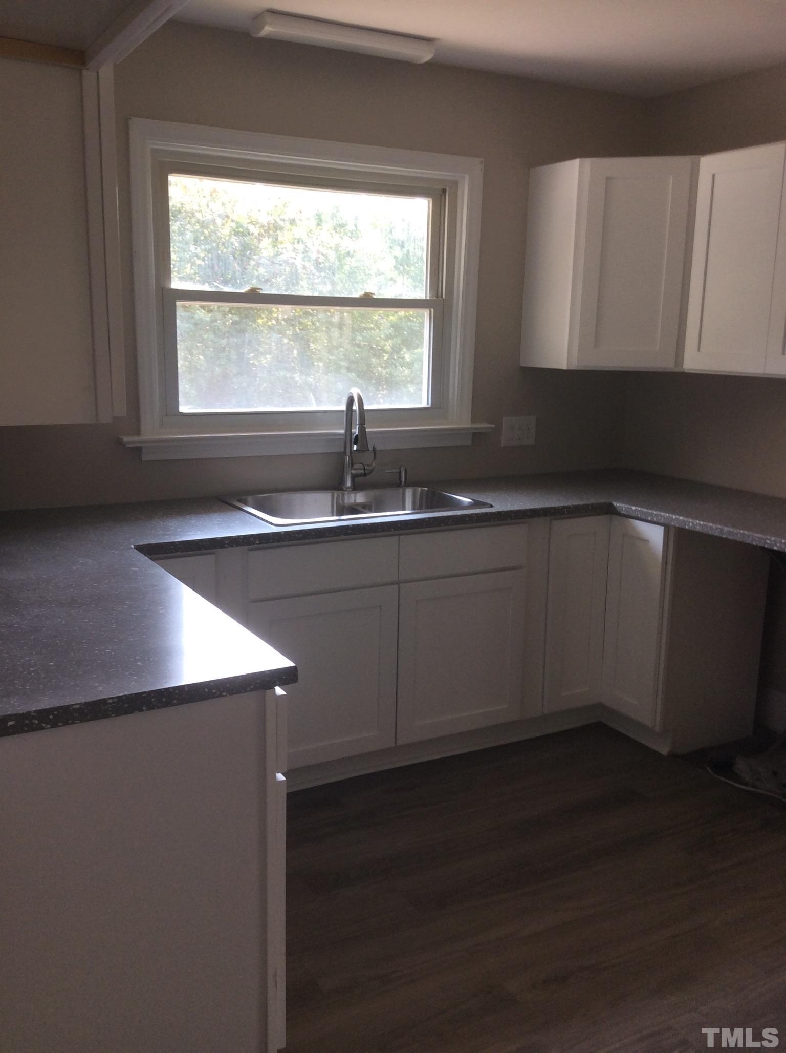3424 Moriah Road Rougemont, NC 27572 - Photo 12 of 20 a kitchen with a sink and a window