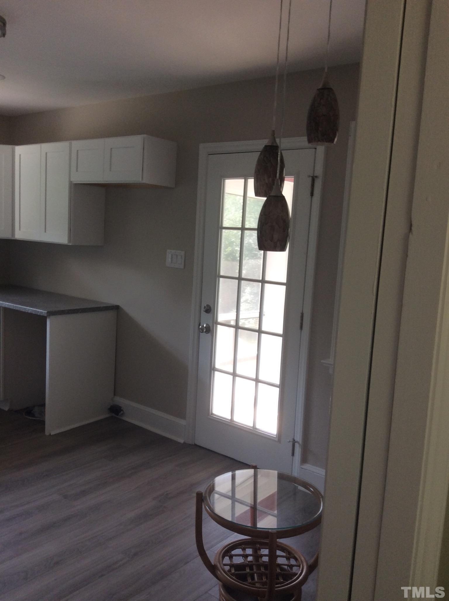 3424 Moriah Road Rougemont, NC 27572 - Photo 14 of 20 a kitchen with a refrigerator and window