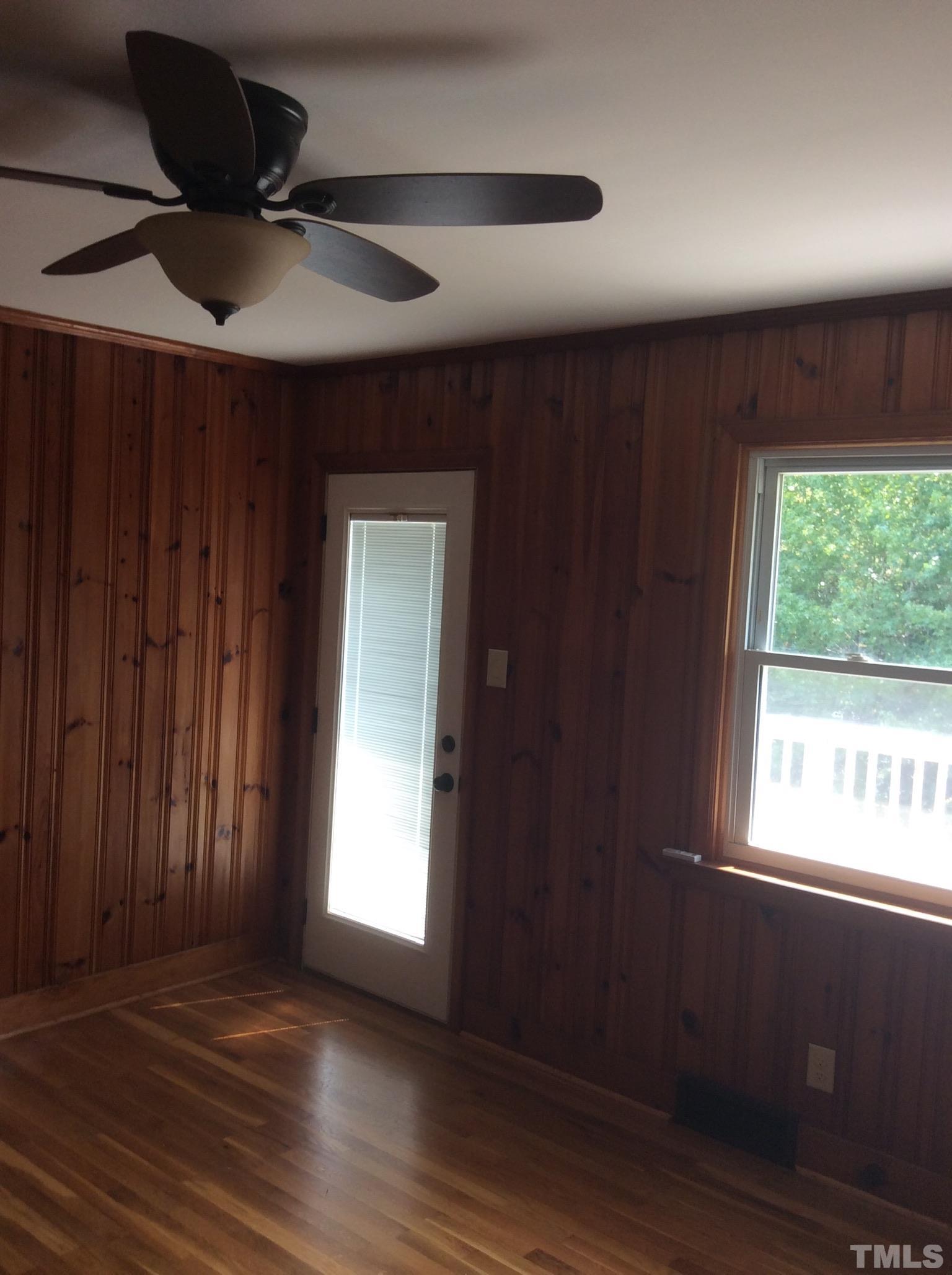 3424 Moriah Road Rougemont, NC 27572 - Photo 16 of 20 a view of an empty room with wooden floor and a window