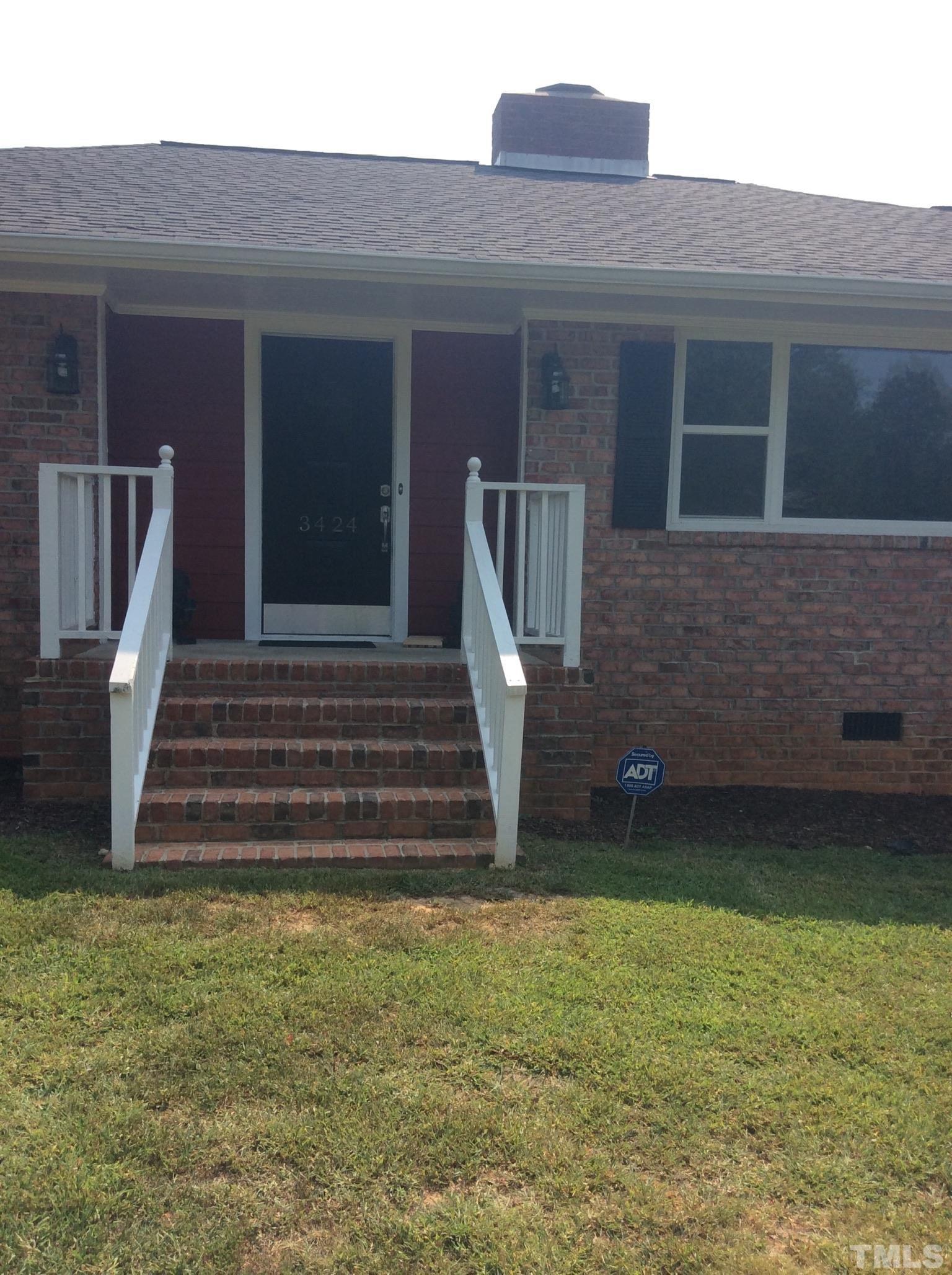 3424 Moriah Road Rougemont, NC 27572 - Photo 3 of 20 a front view of a house with a yard
