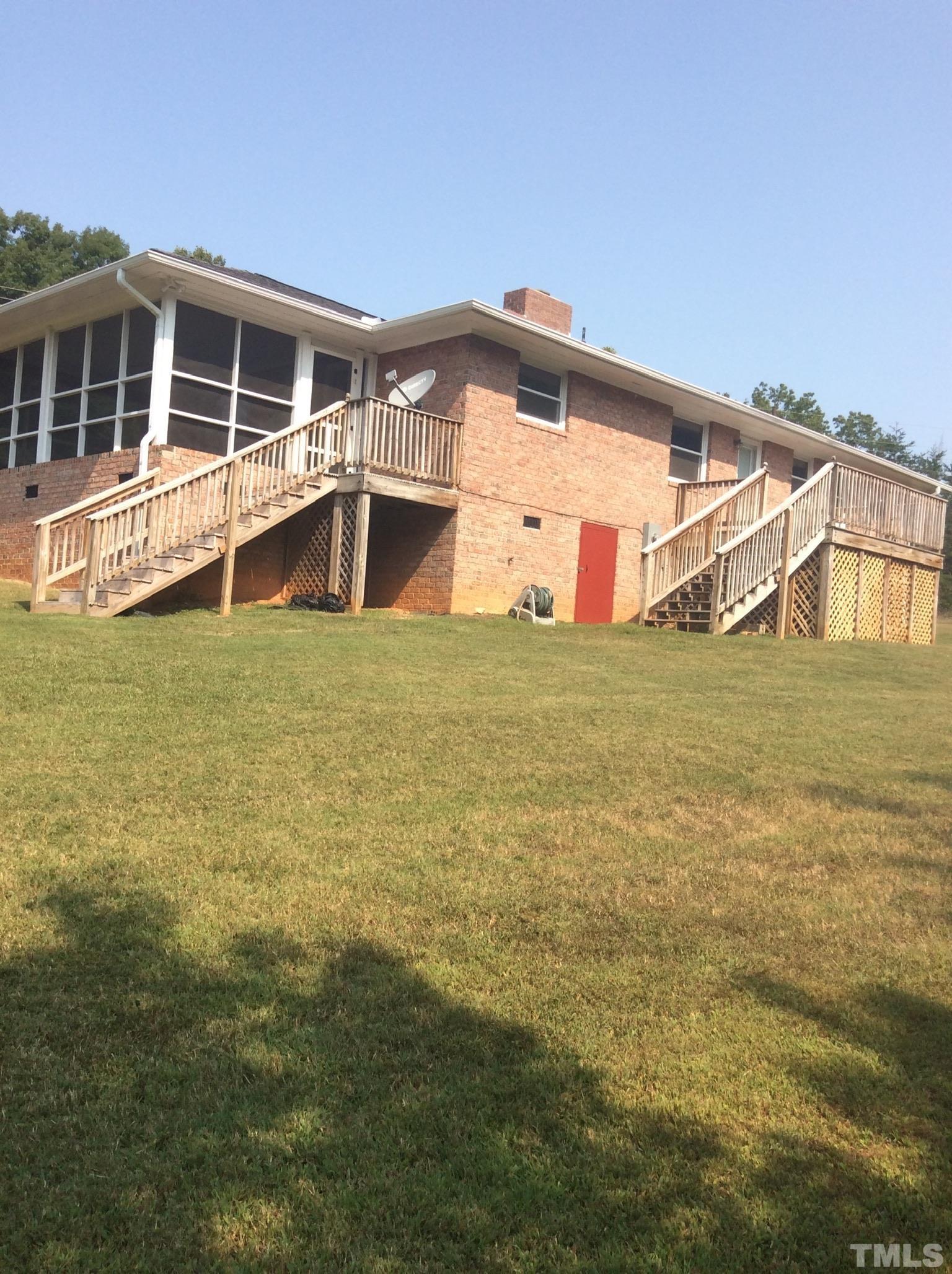 3424 Moriah Road Rougemont, NC 27572 - Photo 6 of 20 a view of a house with a yard