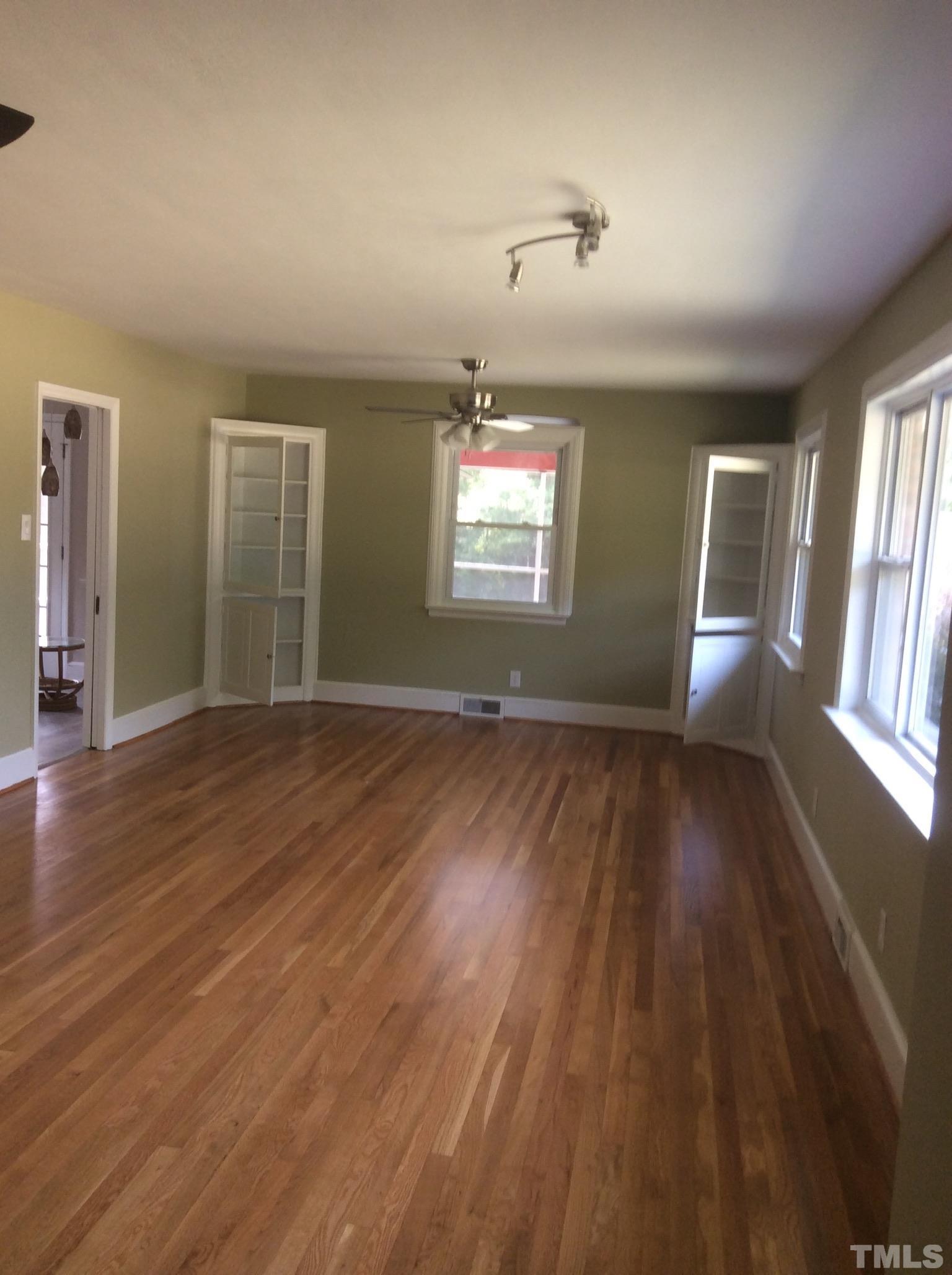 3424 Moriah Road Rougemont, NC 27572 - Photo 7 of 20 wooden floor in an empty room with a window
