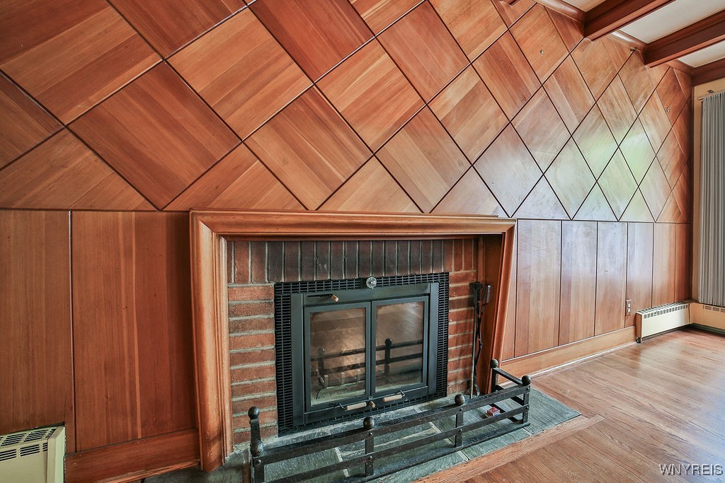 425 Tryon Drive Lewiston, NY 14092 - Photo 10 of 32 woodburning firepace with stunning parquet wood