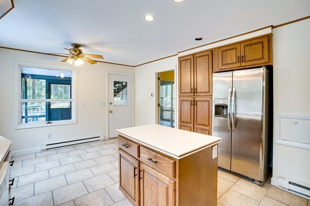 81 January Hills Road Amherst, MA 01002 - Photo 11 of 42 a kitchen with a refrigerator a stove a sink and a refrigerator