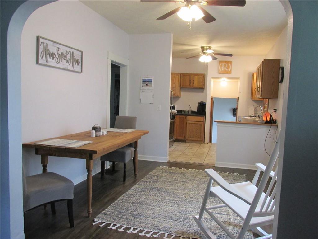 421 Mercer Road Greenville, PA 16125 - Photo 11 of 25 a room with stainless steel appliances kitchen island granite countertop furniture and a refrigerator