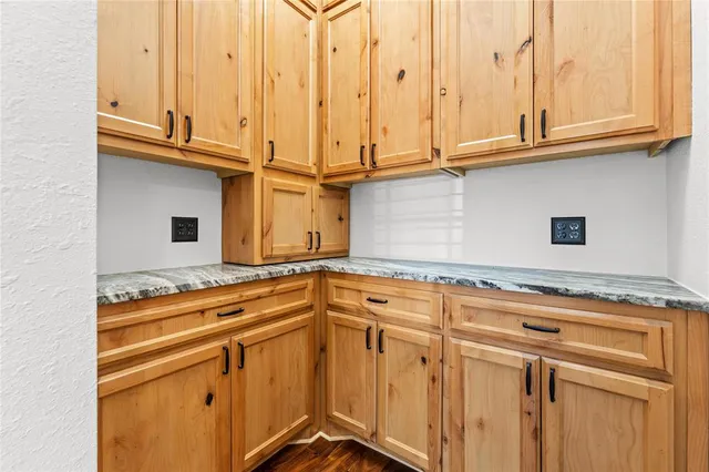 a view of a kitchen with appliances