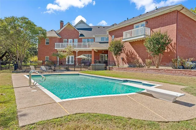 a view of a house with a swimming pool