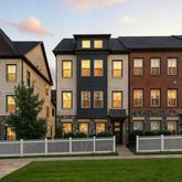 a front view of building with yard