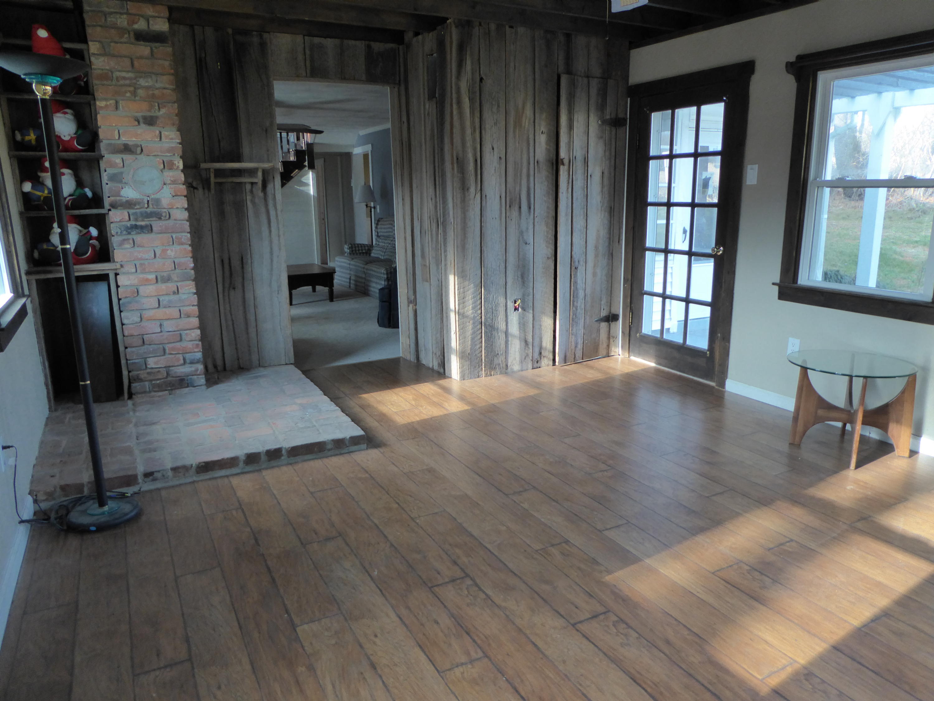 790 Factory Hill Road Callaway, VA 24067 - Photo 8 of 44 a view of a hallway with wooden floor and windows