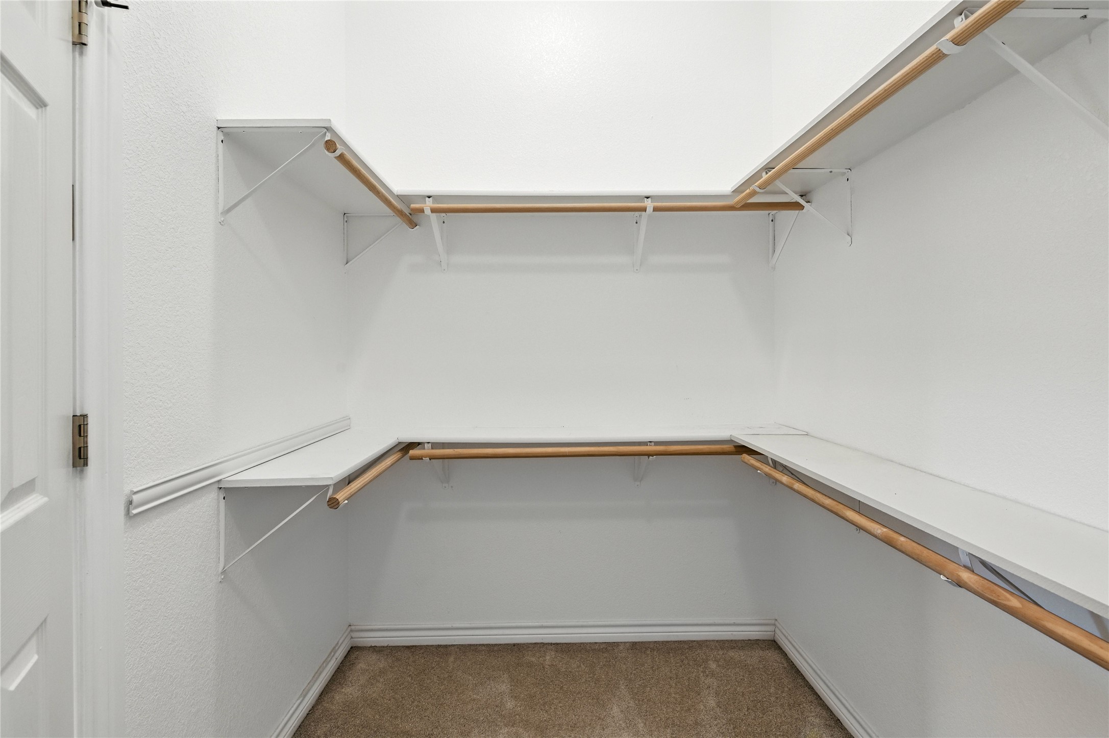 100 Davis Court Thorndale, TX 76577 - Photo 18 of 39 Walk in closet with double clothes rods.