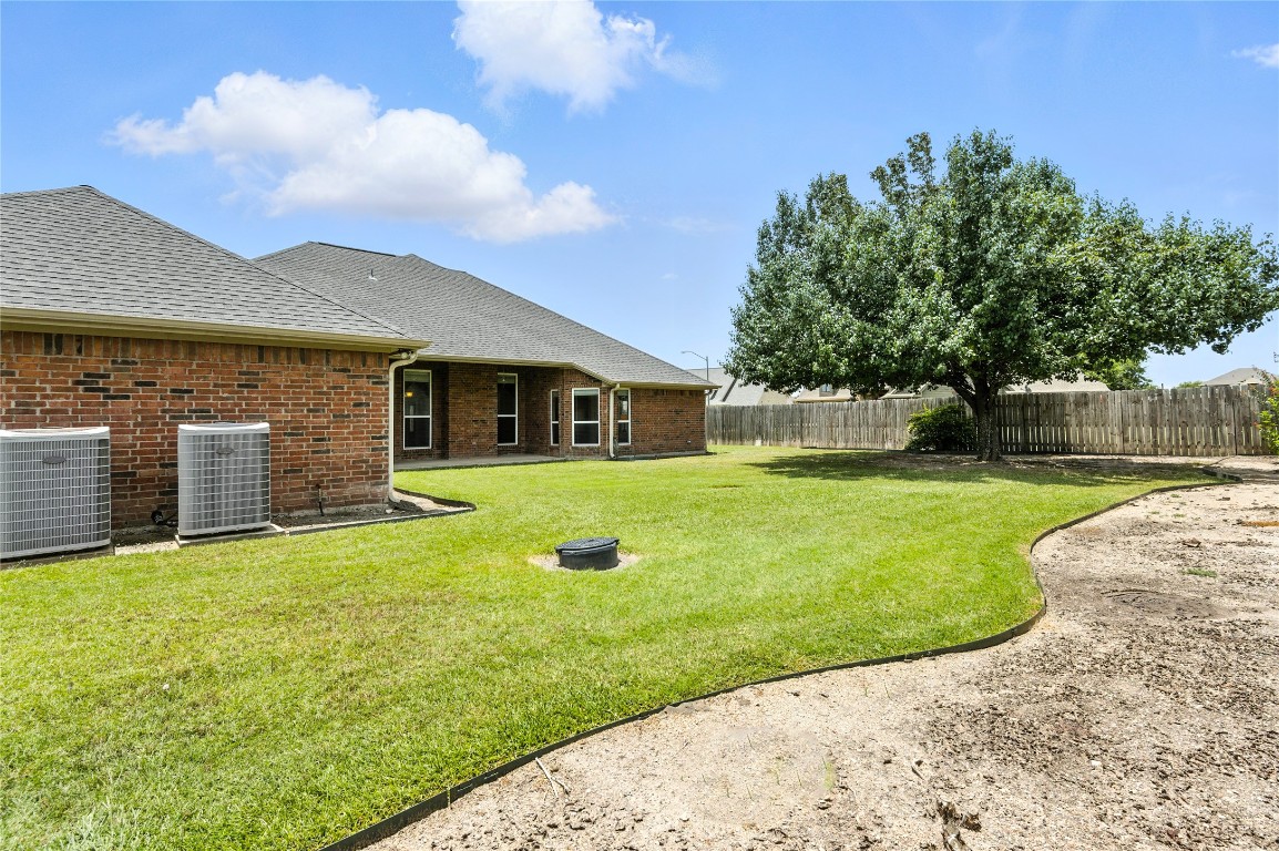 100 Davis Court Thorndale, TX 76577 - Photo 35 of 39 a view of a house with a yard