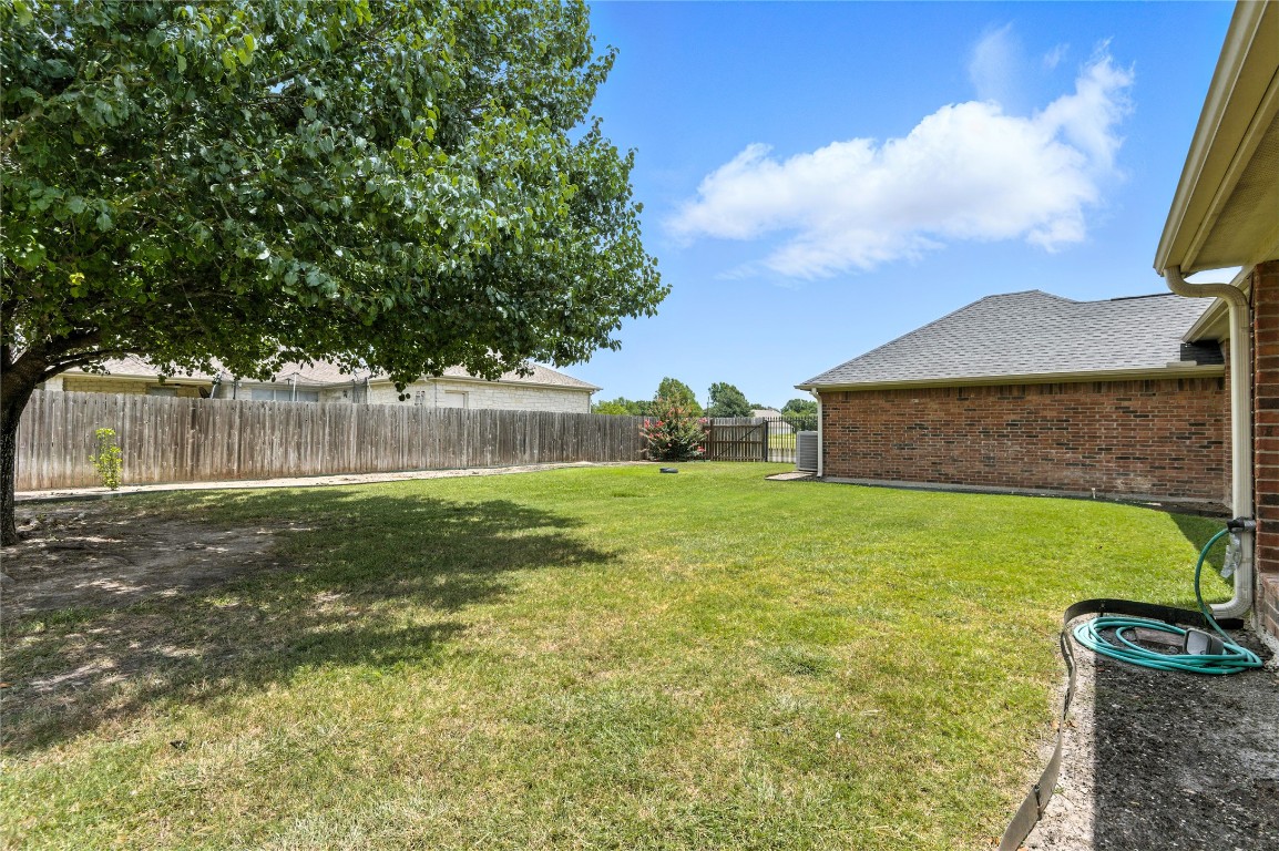 100 Davis Court Thorndale, TX 76577 - Photo 39 of 39 a backyard of a house with lots of green space