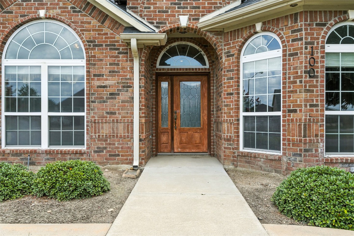 100 Davis Court Thorndale, TX 76577 - Photo 4 of 39 a front view of a house with a garden