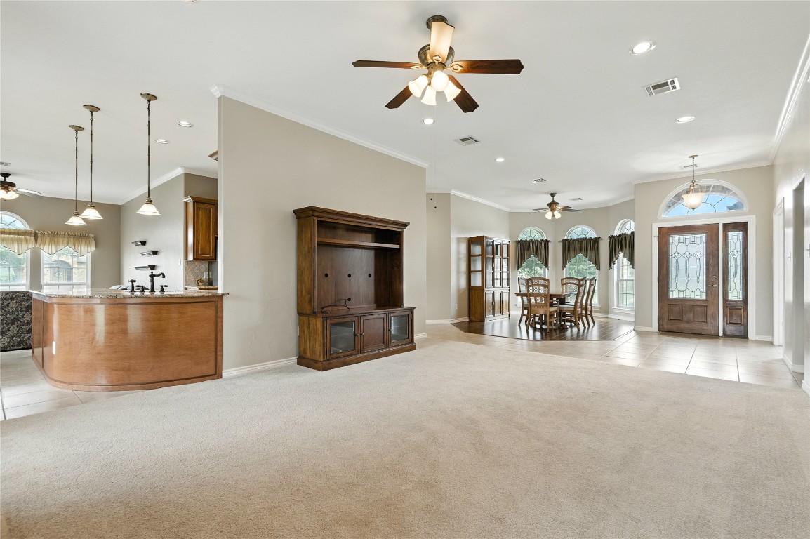 100 Davis Court Thorndale, TX 76577 - Photo 6 of 39 a view of a kitchen with furniture and a large window