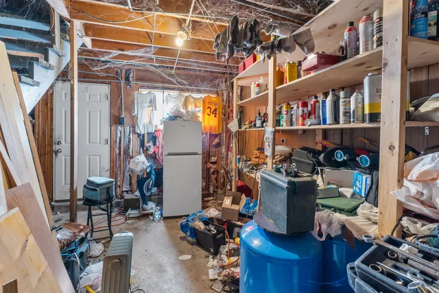 a bathroom with a toilet a sink and a mirror