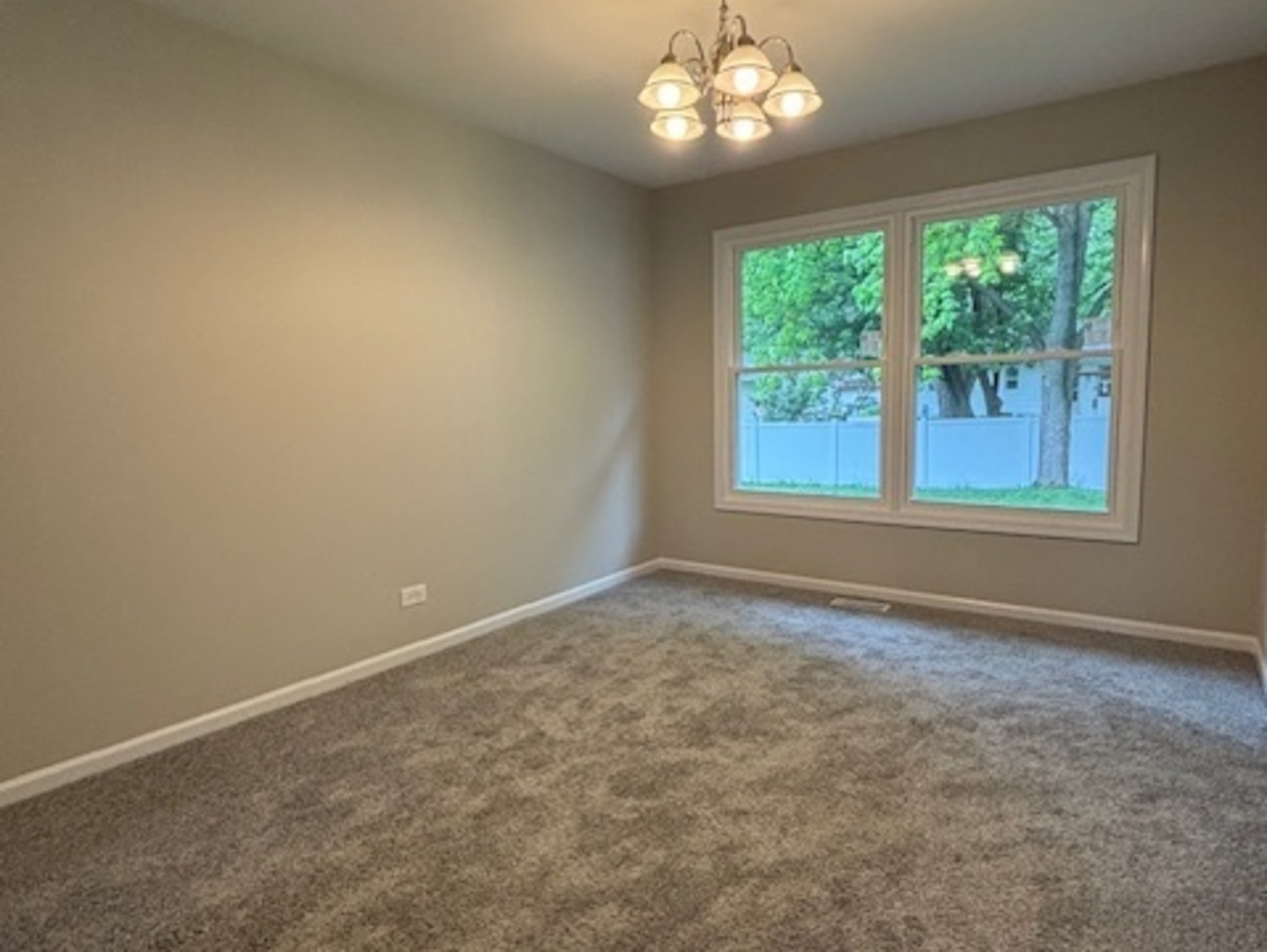 654 Longview Drive Antioch, IL 60002 - Photo 10 of 22 a view of an empty room with a window