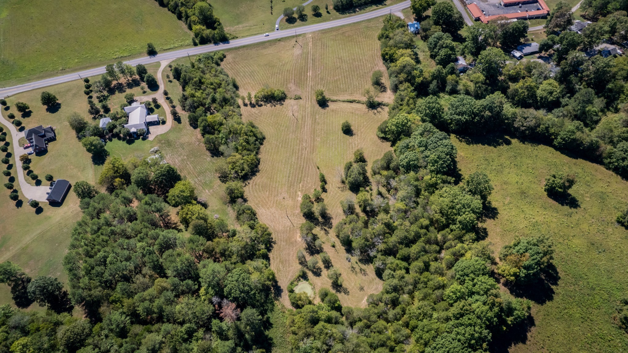 0 Elkton Pike South Pulaski, TN 38478 - Photo 7 of 7 an aerial view of a house with a yard and garden