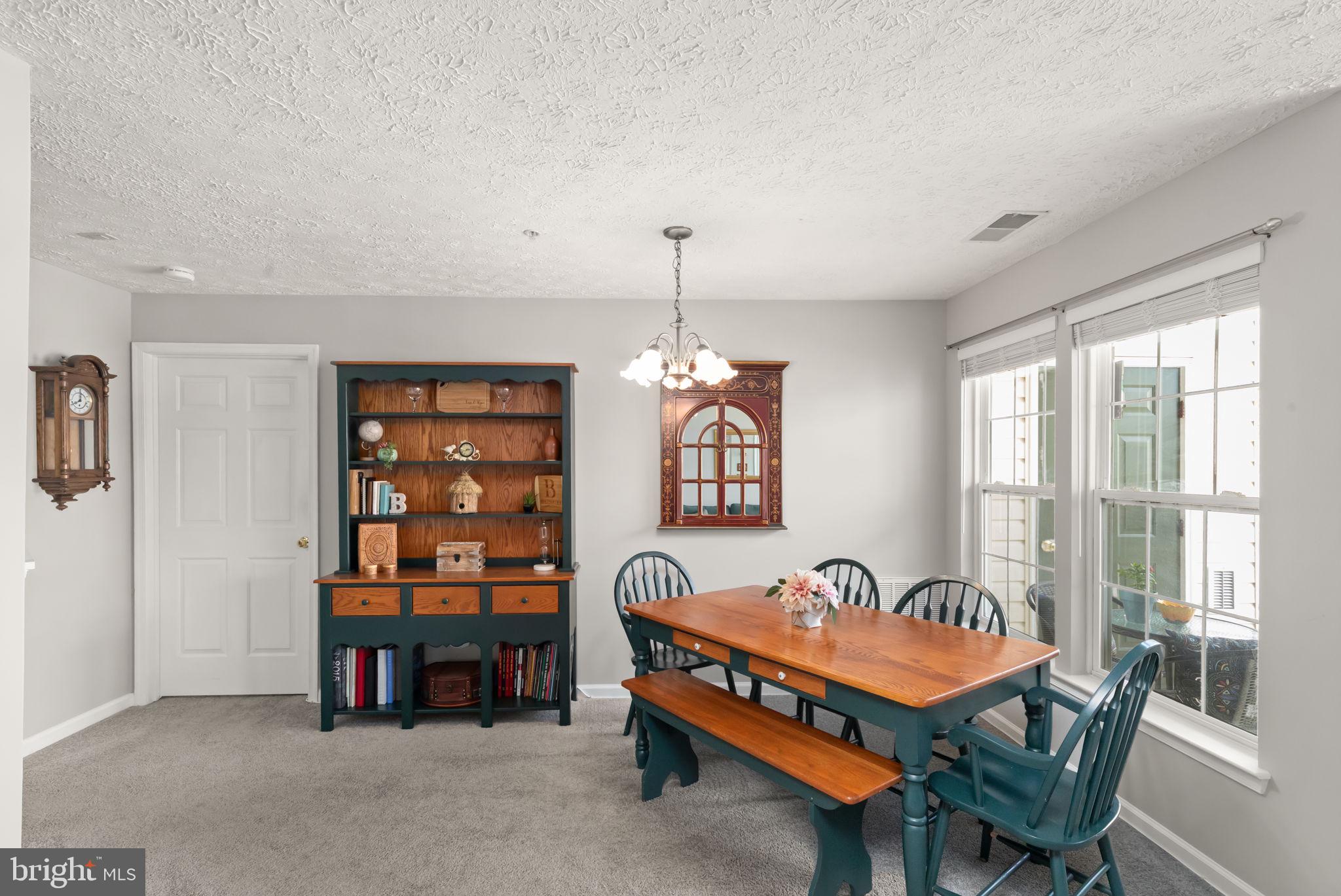 16 Brook Farm Court, Unit 16D Perry Hall, MD 21128 - Photo 10 of 23 a bedroom with furniture and a window