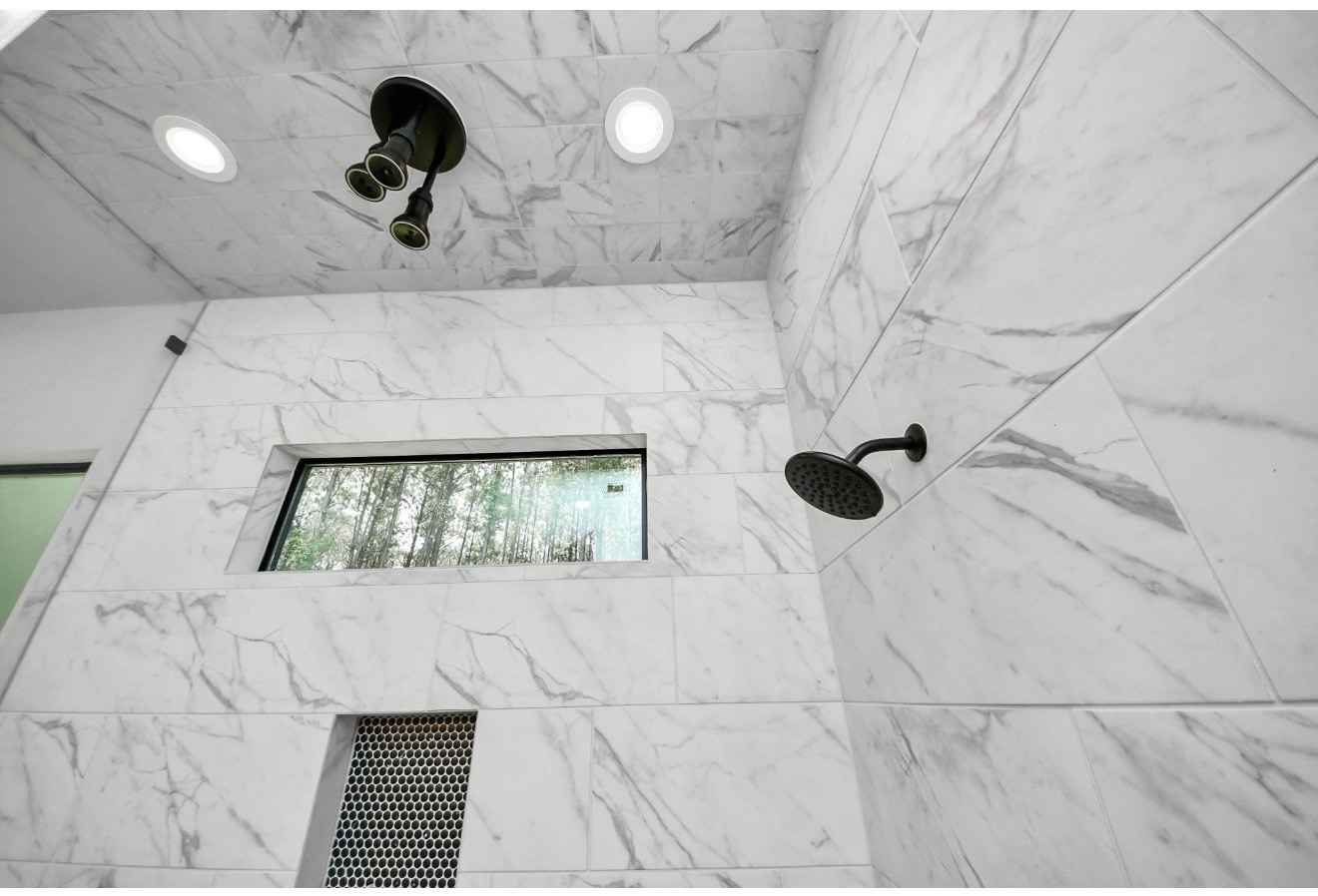 12784 Oak Barrel Road Willis, TX 77378 - Photo 15 of 28 a bathroom with a bathtub and a shower