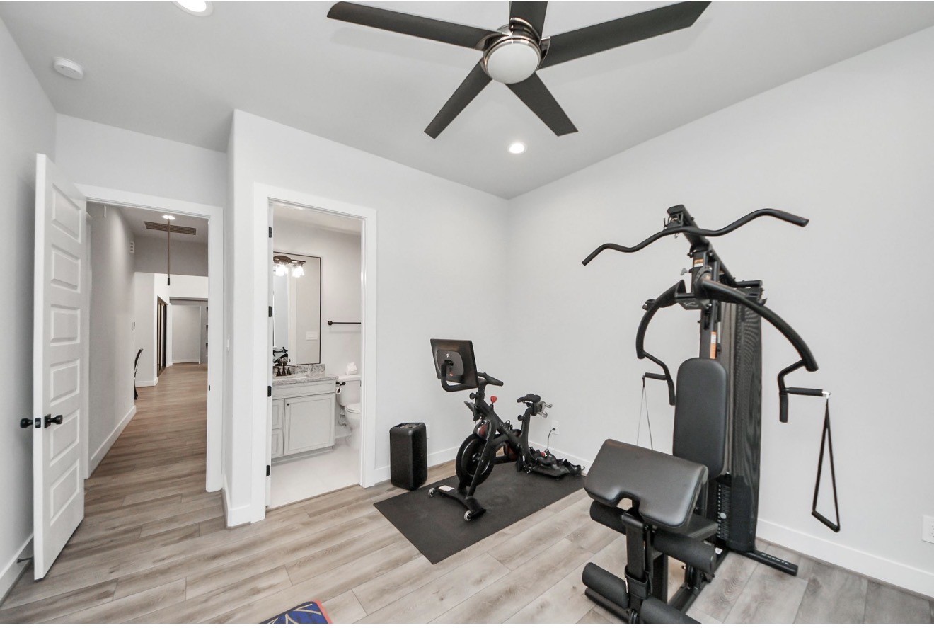 12784 Oak Barrel Road Willis, TX 77378 - Photo 20 of 28 a view of a room with gym equipment