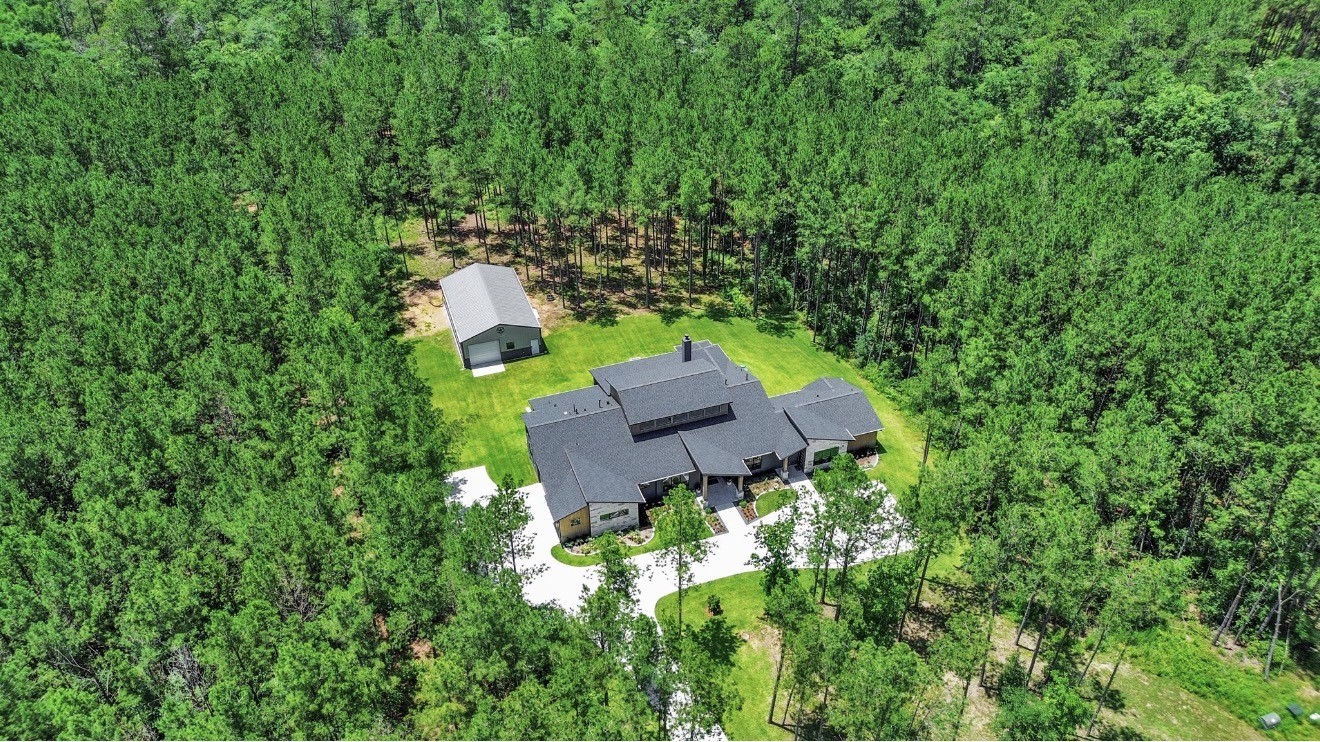 12784 Oak Barrel Road Willis, TX 77378 - Photo 6 of 28 an aerial view of a house with a yard