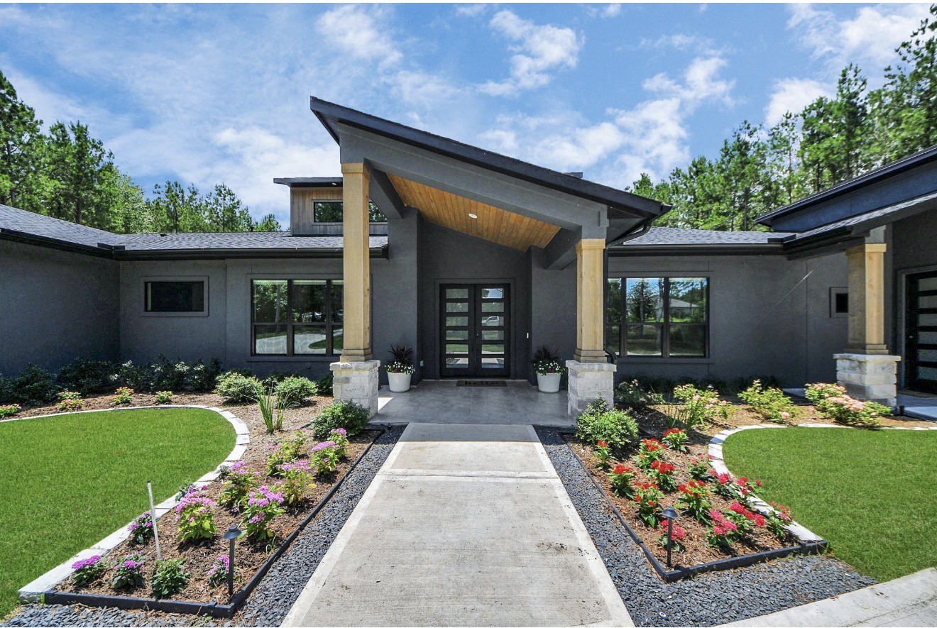 12784 Oak Barrel Road Willis, TX 77378 - Photo 7 of 28 front view of a house with a yard