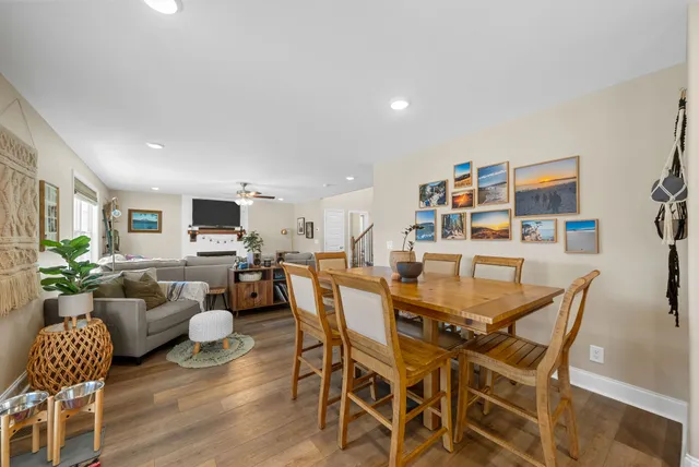 a kitchen with cabinets stainless steel appliances a sink and a stove