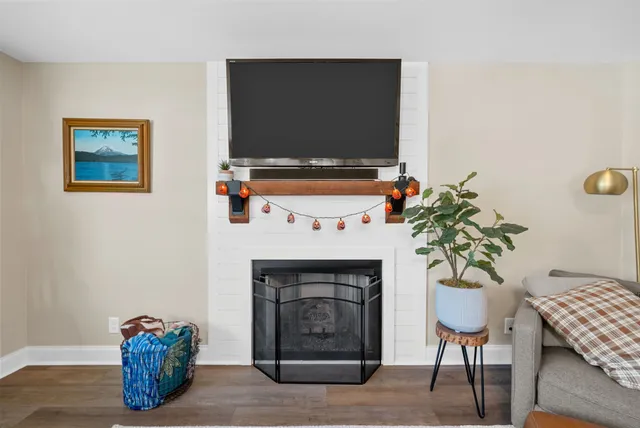 a view of a dining room with furniture and a rug