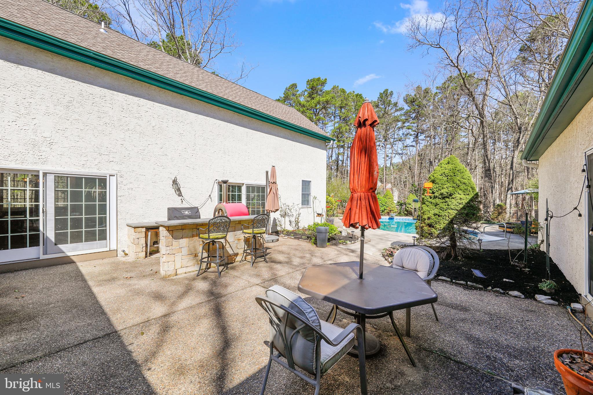 4 Ridge Court Medford, NJ 08055 - Photo 36 of 49 Backyard Courtyard with Outdoor Kitchen