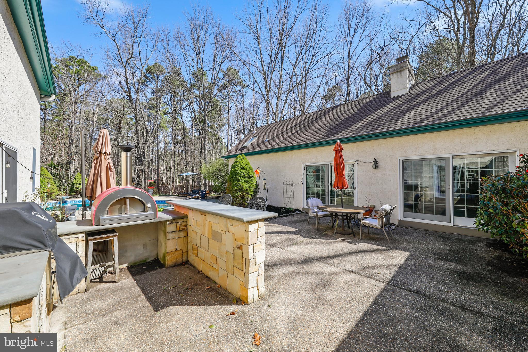 4 Ridge Court Medford, NJ 08055 - Photo 37 of 49 Backyard Courtyard with Outdoor Kitchen