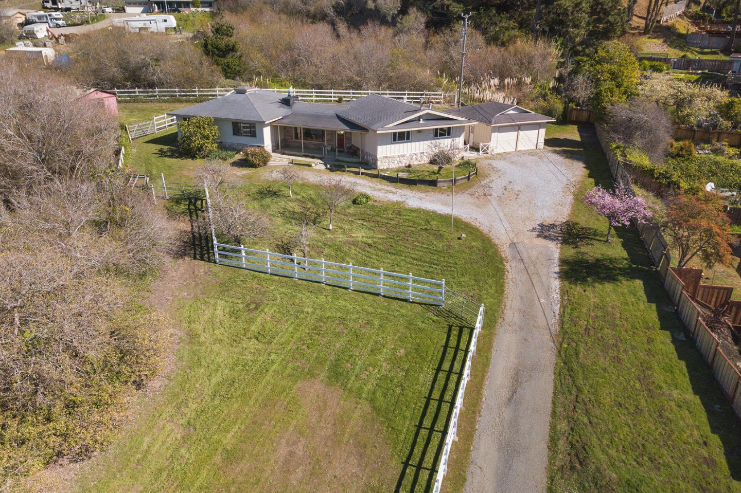 a view of residential houses with outdoor space