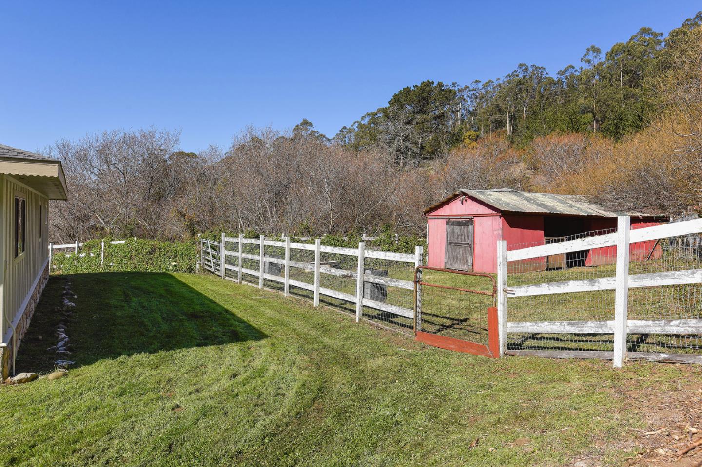 991 Zamora Drive Pacifica, CA 94044 - Photo 25 of 26 a front view of a house with a yard