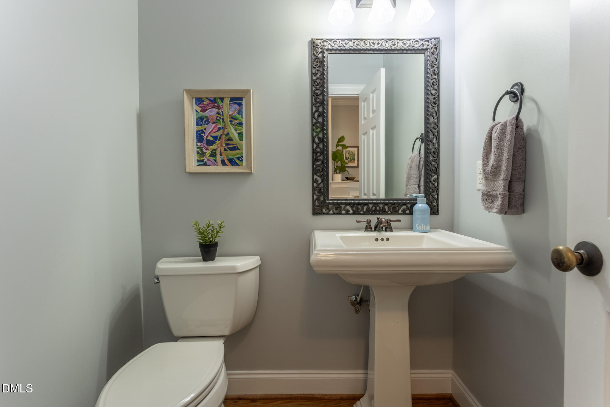 10 Highgrove Lane Durham, NC 27713 - Photo 15 of 41 a bathroom with a toilet sink and mirror