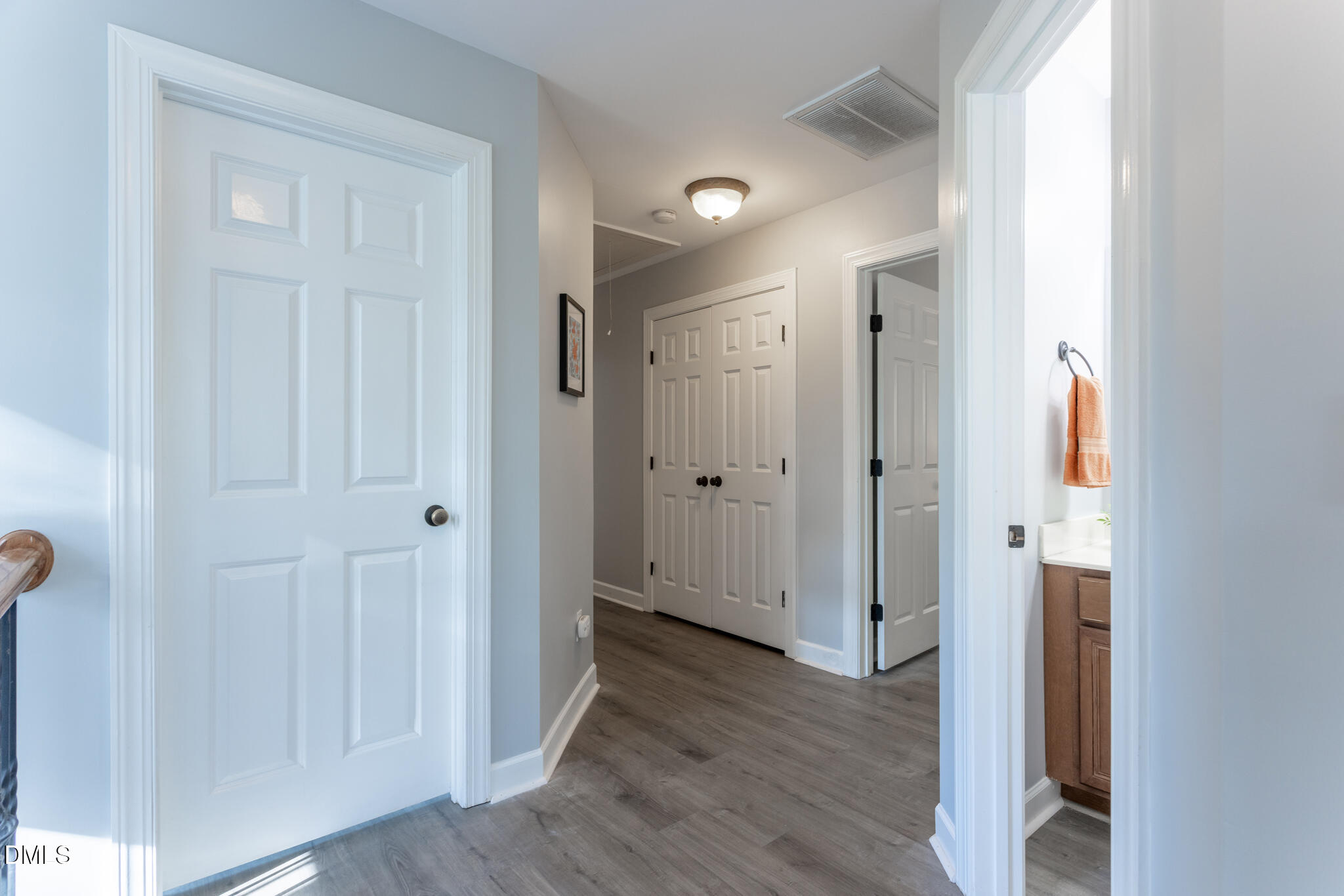 10 Highgrove Lane Durham, NC 27713 - Photo 18 of 41 a view of a hallway with wooden floor