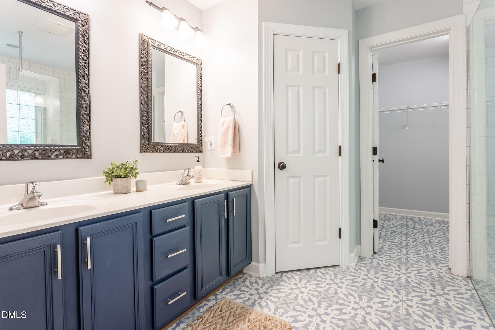 10 Highgrove Lane Durham, NC 27713 - Photo 21 of 41 a bathroom with a sink and a mirror