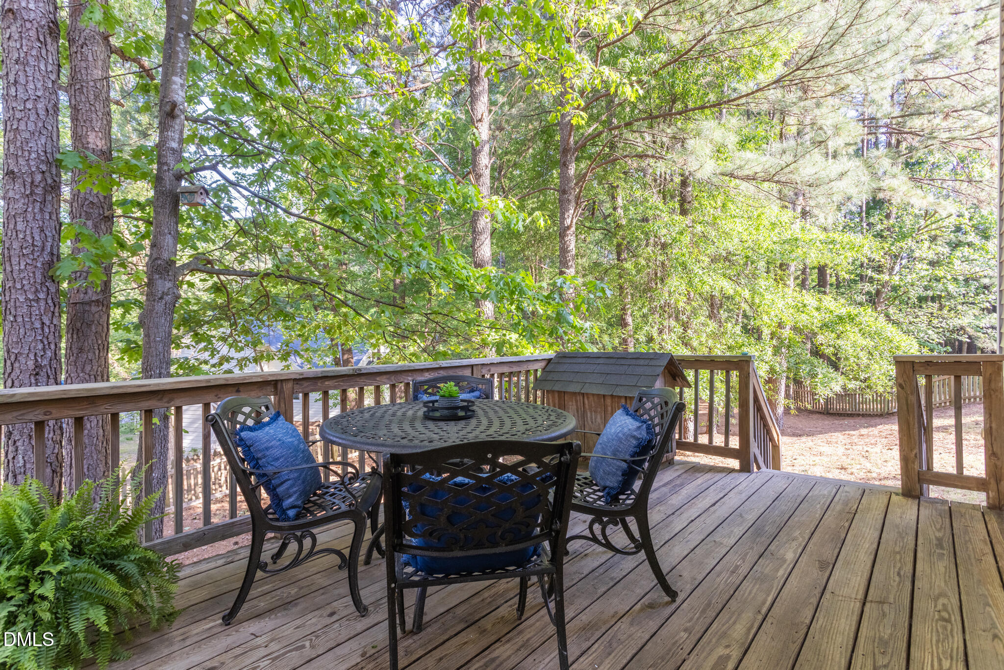 10 Highgrove Lane Durham, NC 27713 - Photo 30 of 41 a view of a wooden chairs and table on the deck