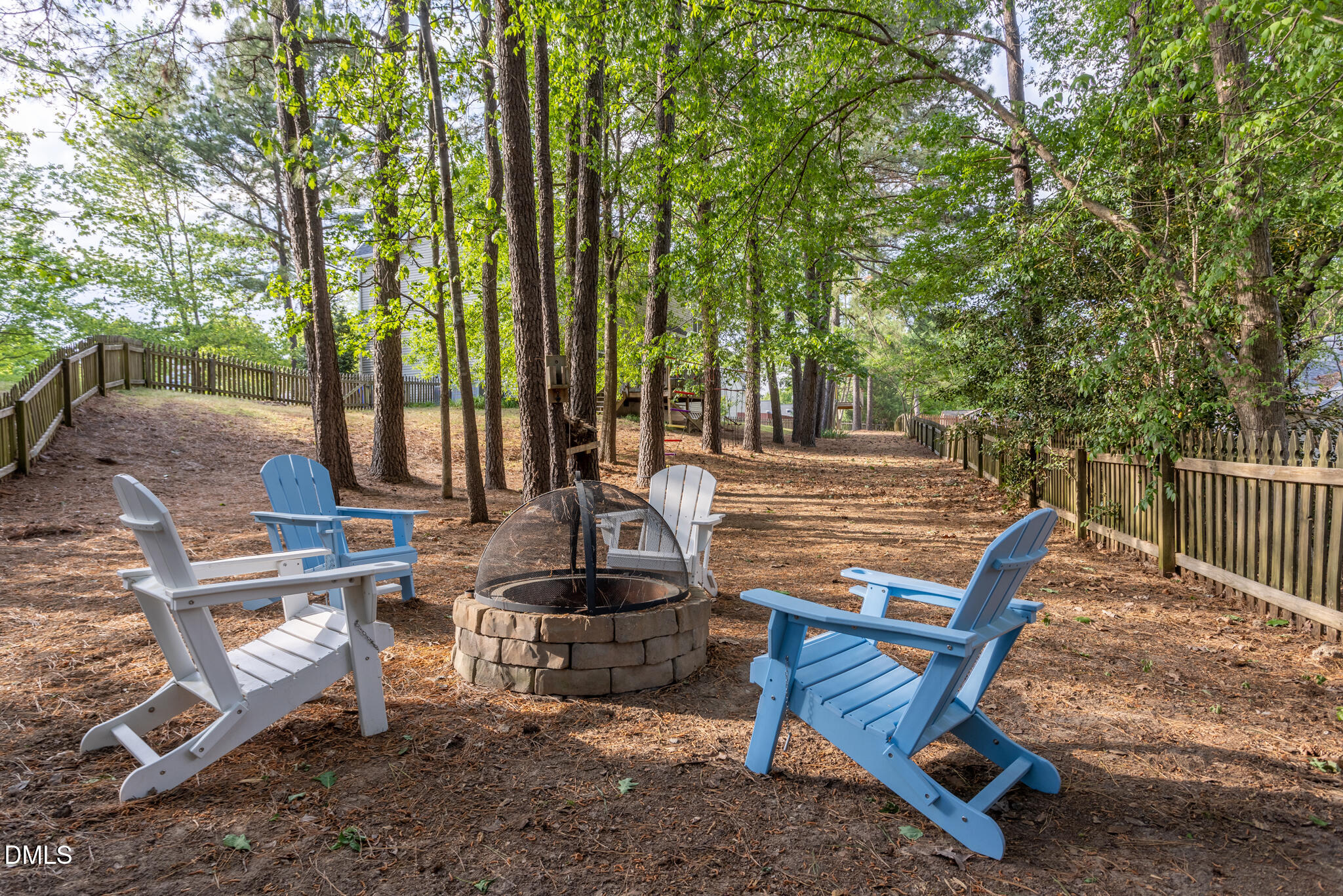 10 Highgrove Lane Durham, NC 27713 - Photo 31 of 41 a view of backyard with sitting area and outdoor seating