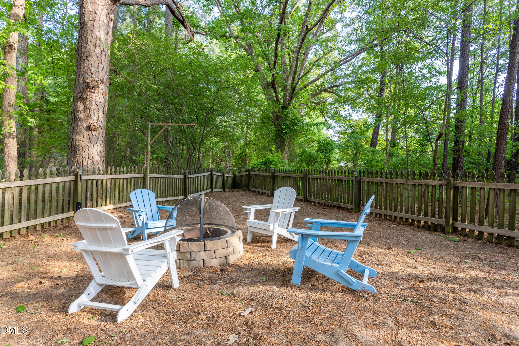 10 Highgrove Lane Durham, NC 27713 - Photo 32 of 41 a view of a chairs and table in the back yard